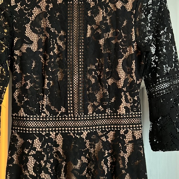 Lovely lace dress. Doesn’t show much skin, but gives you some mystery - Picture 3 of 3